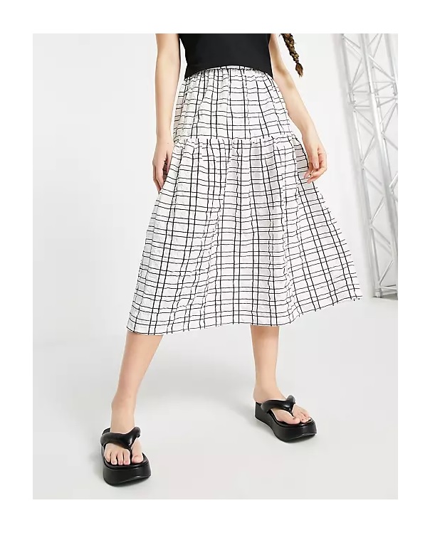 Image of textured midi skirt in mono check print